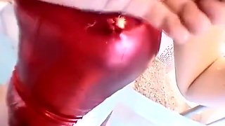 Shiny red metalic swimsuit in the pool