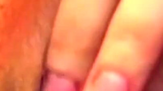 Seductive Brunette Strips and Fingers Her Dripping Pussy Wildly