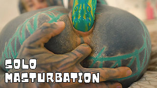 Heavily Tattooed Teen Fucks Herself With Big Dildo