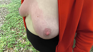 beating her tits in the woods