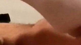 MILF in Pantyhose and Heels Gives a Footjob