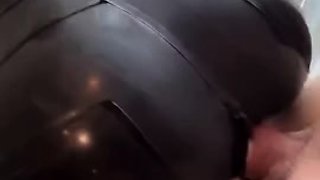 A babe in latex and piss