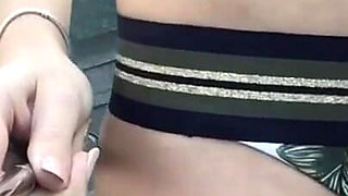 Skinny babe Lovenia Lux toys her wet cunt during making selfie outdoor