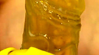 Indian Pregnant Stepsister in Yellow Gloves Plays with a Dildo and Talks Dirty