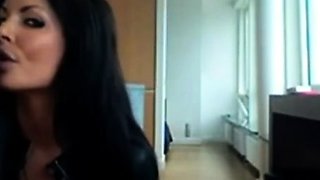 Smoking Hot Brunette Milf in Latex Catsuit and Boots