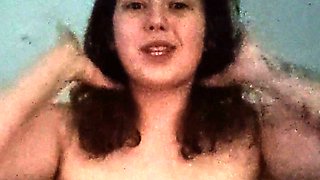 Busty curly brunette with big boobs fucks on couch