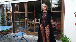 A Mature Woman Shows off Her Figure Outside in a Lace Bodysuit!