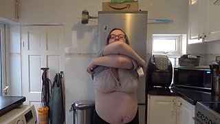 Mom with massive tits strips down in the kitchen