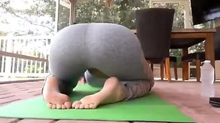stepmother exercising and her stepson helps her