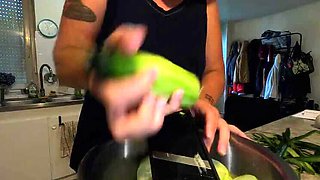 Hot French MILF Kahann masturbates with cucumber in kitchen close-up amateur video