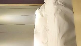 Cute amateur asian web cam girl playing with her toy