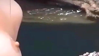 Slippery Naked Sunbathing Turns Into a Naughty Solo