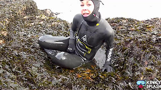 Rubbery Beach Encounter: Lucy's Neoprene Pussy Play with Stranger