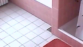 Amateur blonde masturbates on toilet