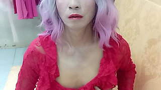 Transgender Oanh Le wears sexy clothes porn selfie with a homemade cuff