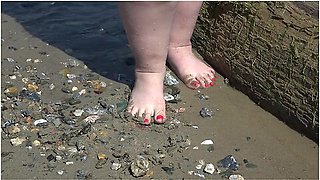 Fat Bare Legs With Red Pedicure Walk Along The Bank Of The River, Fetish