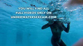 Underwater sex in public pool filmed with a hidden cam