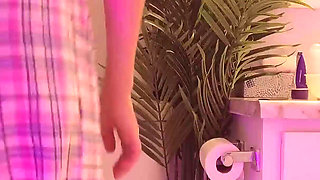 Emily pissing in the bathroom