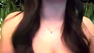 Brunette seductress working her big boobs and hot ass