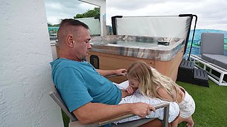 Blonde-haired bimbo Skyler Storm pleasures her daddy outdoors