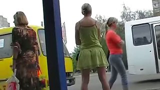 Tight shorts girl is on the bus stop