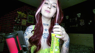 Sexy Alternative Redhead Drinking Soda and Burping