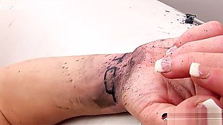 Busty brunette Hunter Bryce squirts then gets tattooed