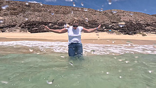 Girl Wetting Jeans in the Ocean and Swimming in Wet White T-shirt
