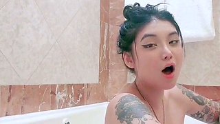 Busty babe playing with her big boobs