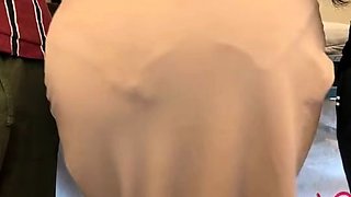 Brunette seductress working her big boobs and hot ass