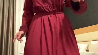 Fatima dancing in hotel room